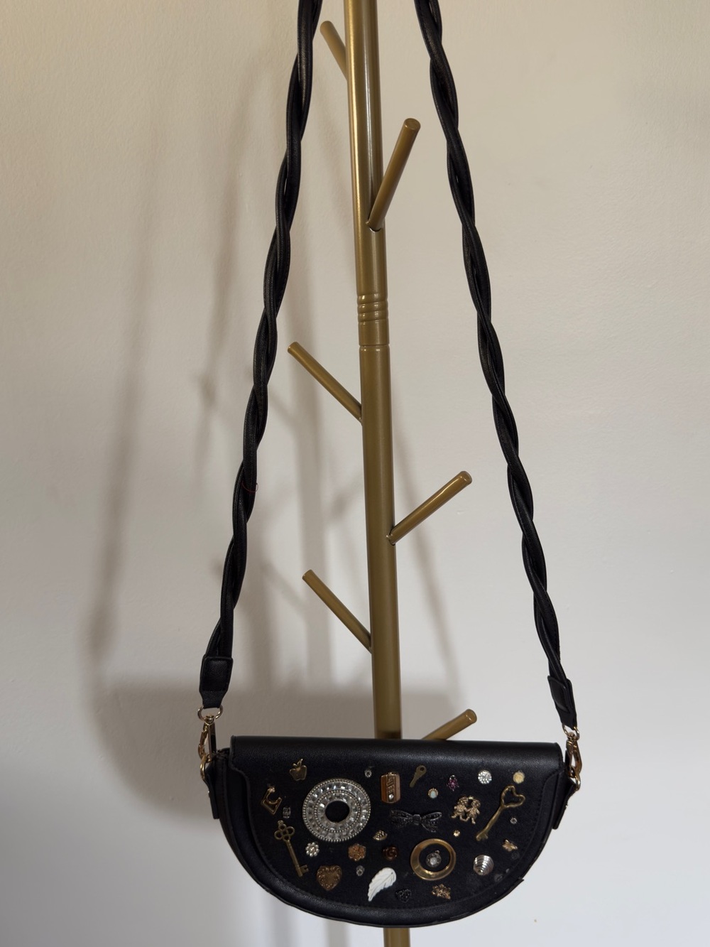 Black “charms” Half-Moon Crossbody Bag